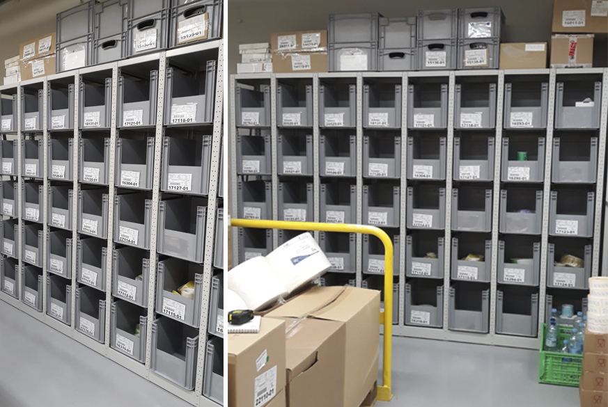 Estanteria metalica modular con guías para el almacenamiento manual en cajas plásticas de herramientas y recambios instalada en el departamento de mantenimiento de una planta de envasado químico